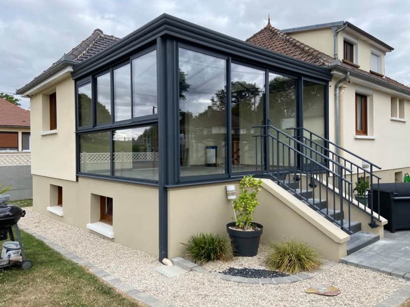 Véranda sur terrasse à Grandvilliers